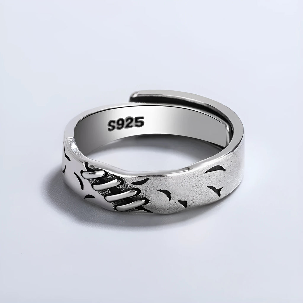 Black geometric copper women's ring with adjustable opening showing round and oval design elements