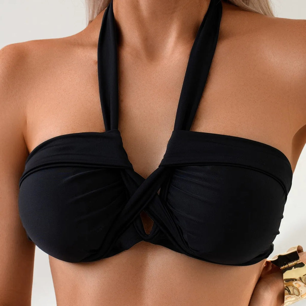 Black backless solid colour bikini swimsuit on a size chart showing S, M, L options