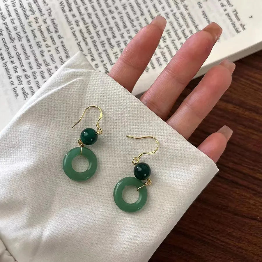 Green jade design peace buckle shaped Chinese style earrings with zinc alloy construction