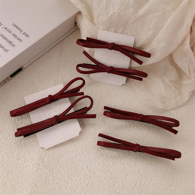 Wine red leather bow hair barrettes with manual processing and advanced styling for women