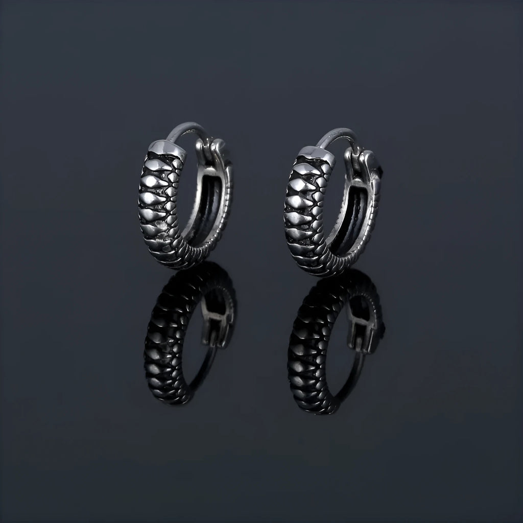 Geometric silver retro twist earrings with stripe detailing on circular titanium steel hoop