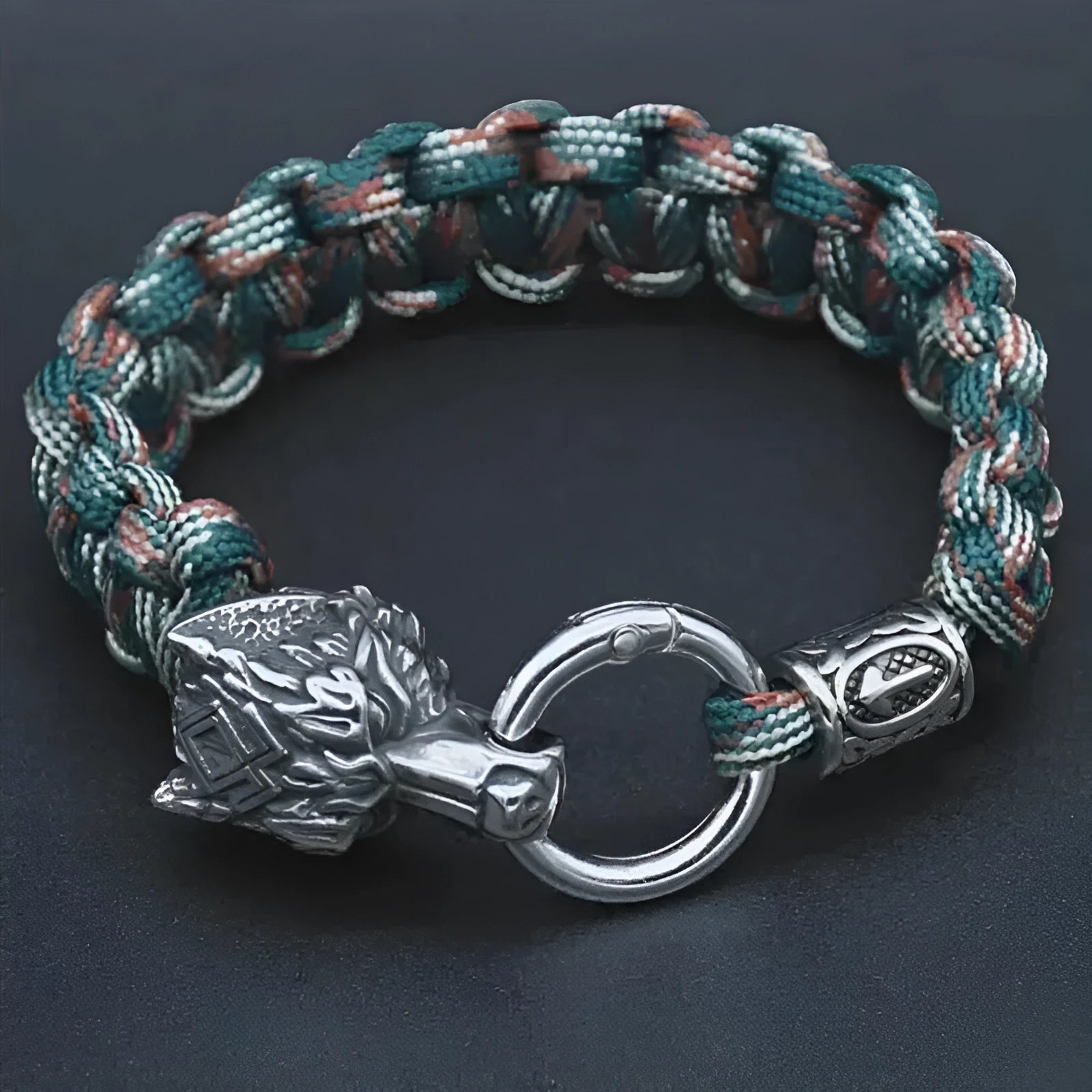 Handmade stainless steel wolf head bracelet with Luen character engraving in camouflage colour.