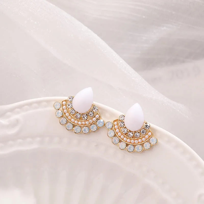 Women's retro fan-shaped rhinestone earrings with electroplated silver finish and geometric design