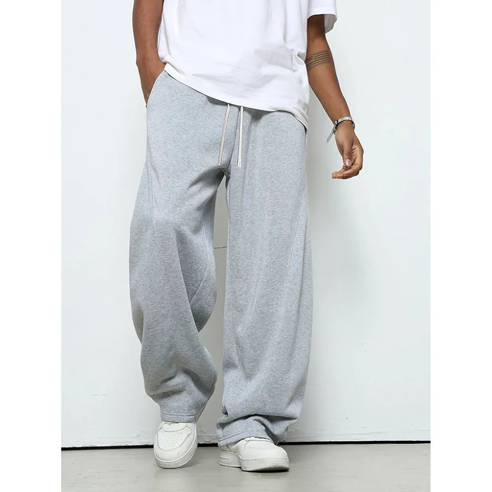 Men's solid colour straight leg casual trousers with a drawstring waistband.