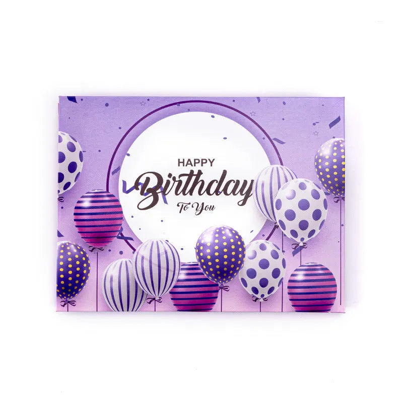 Open 3D pop-up greeting card with Chinese ink style cake illustration, showing manual folding detail.