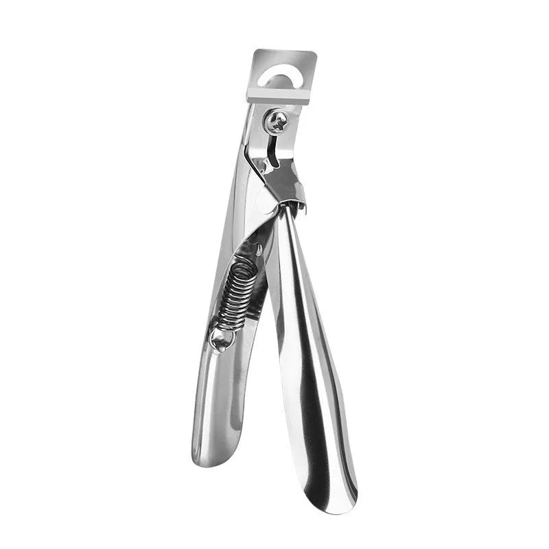 Stainless steel French U-shaped nail art scissors on a neutral background.