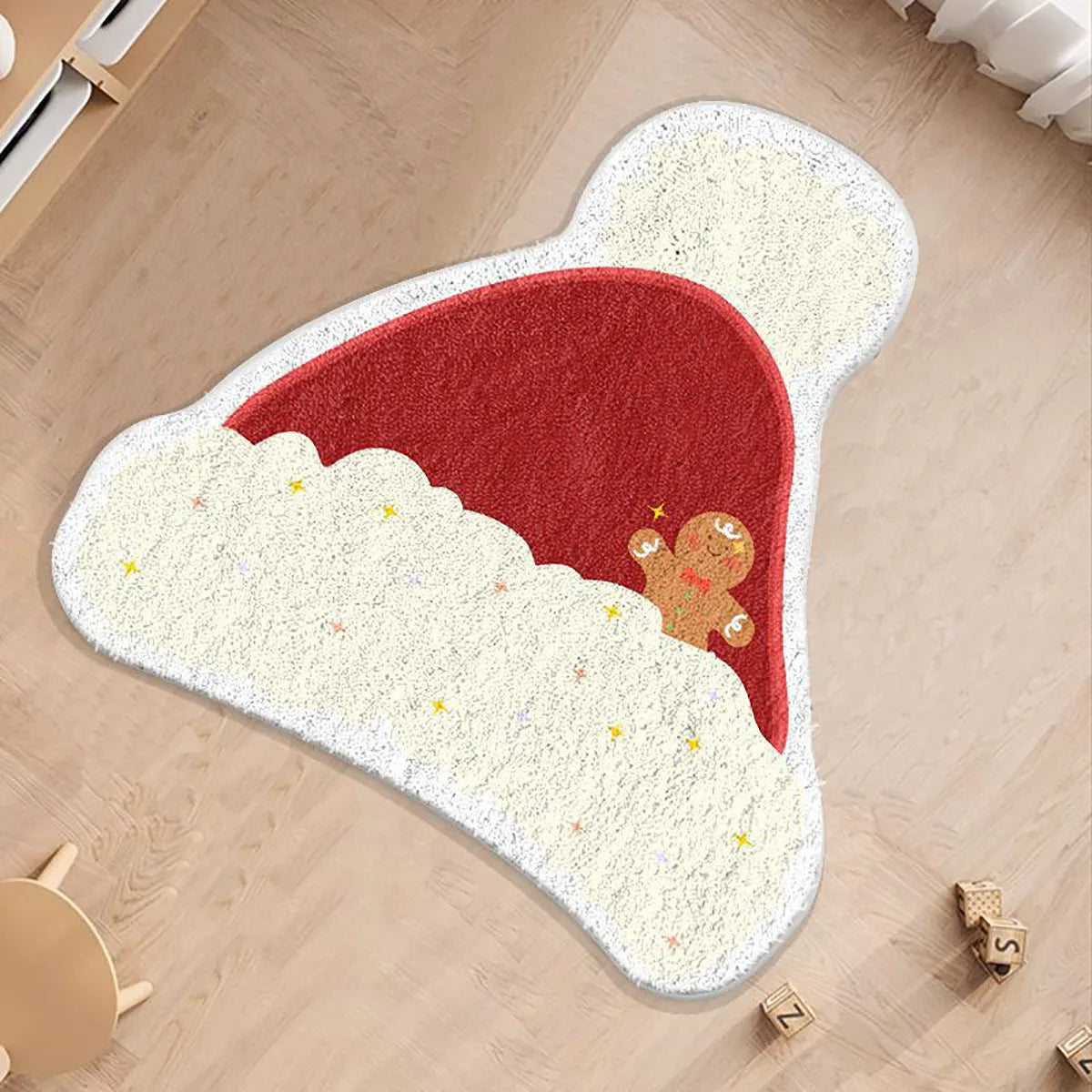 Round Christmas floor mat in imitation cashmere with festive designs including gingerbread men and Christmas trees