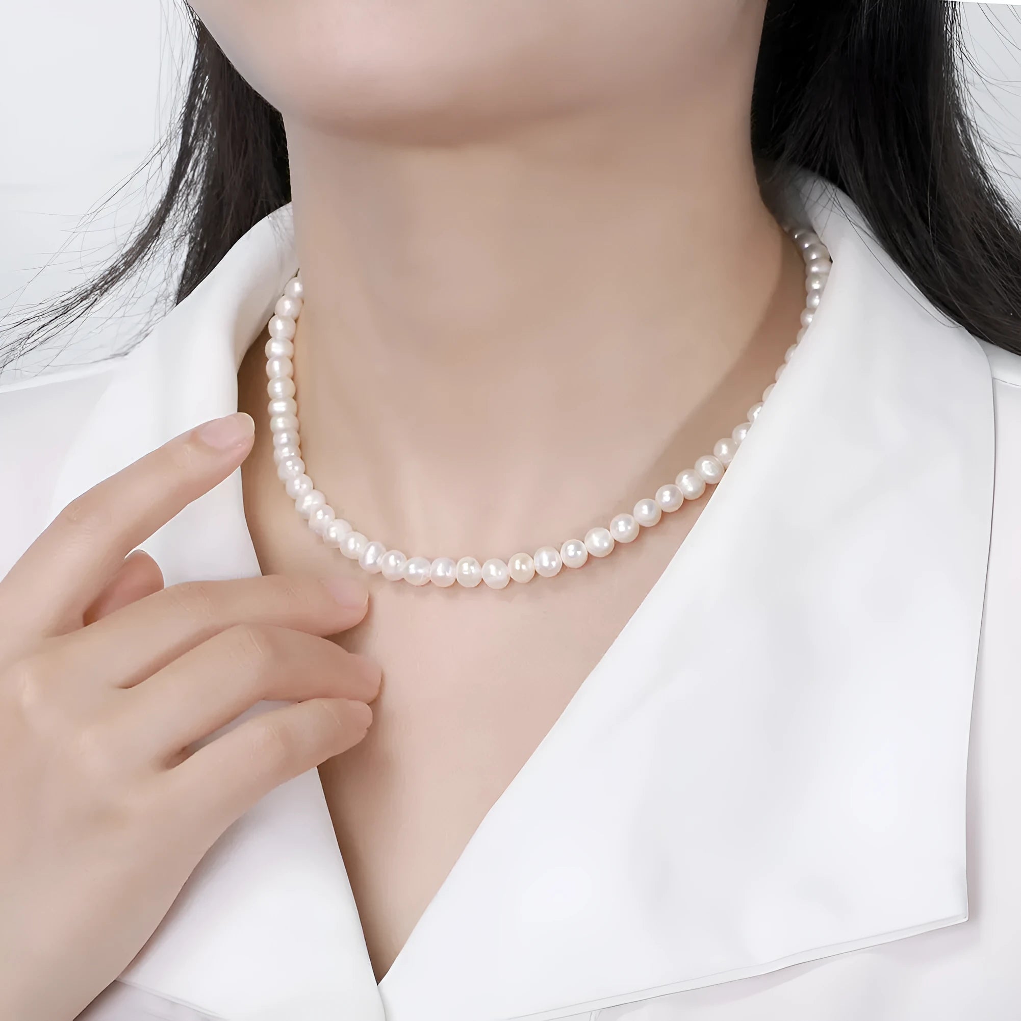 Women's adjustable freshwater pearl necklace with 6-7mm natural pearls on sterling silver chain