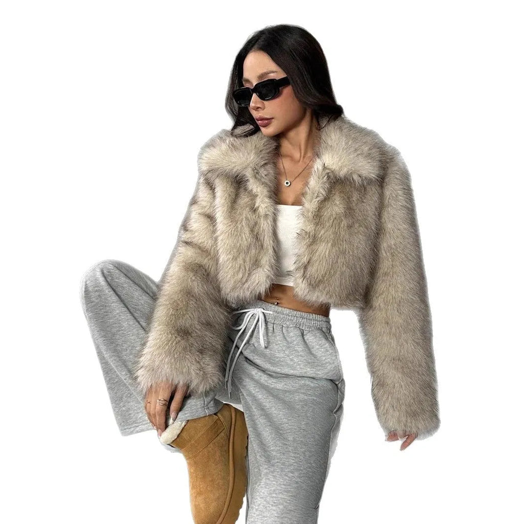 Short black artificial fur coat with a large fur collar, shown on a model.