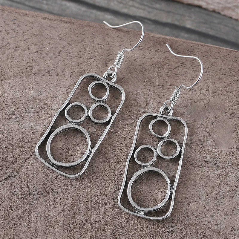 Geometric round earrings with irregular square design in antique silver finish