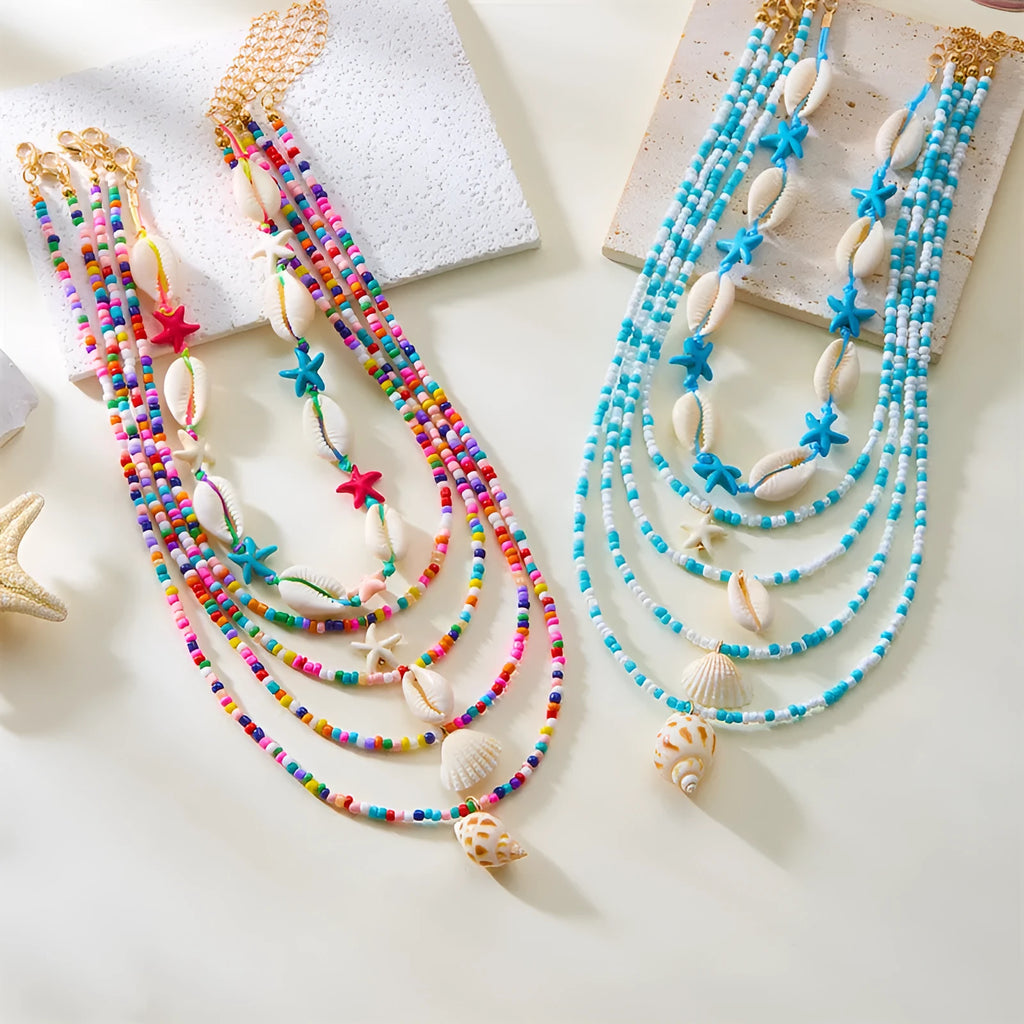 Women's starfish shell bead necklace 5-piece set with electroplated alloy pendants showing blue and mixed colour variations