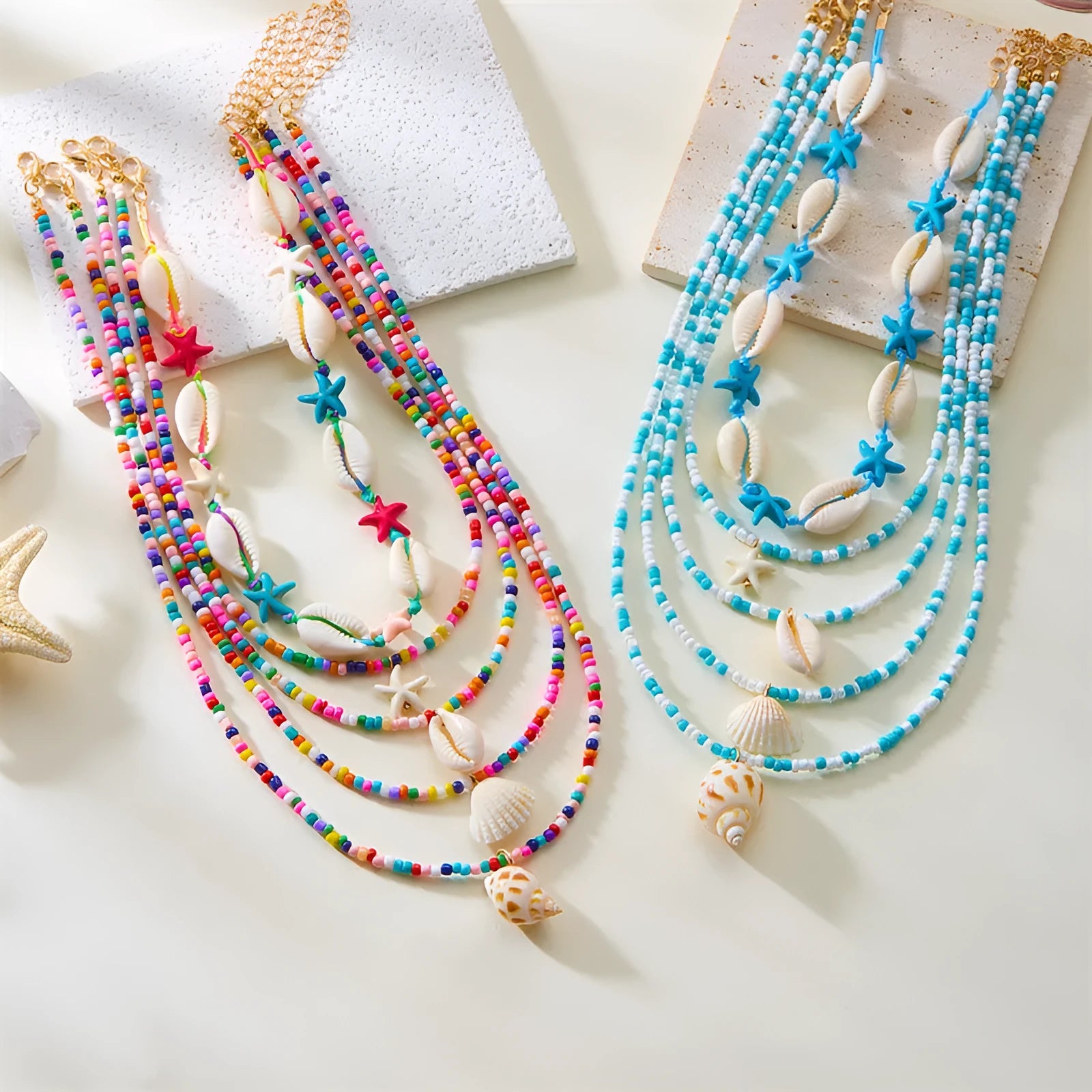 Women's starfish shell bead necklace 5-piece set with electroplated alloy pendants showing blue and mixed colour variations