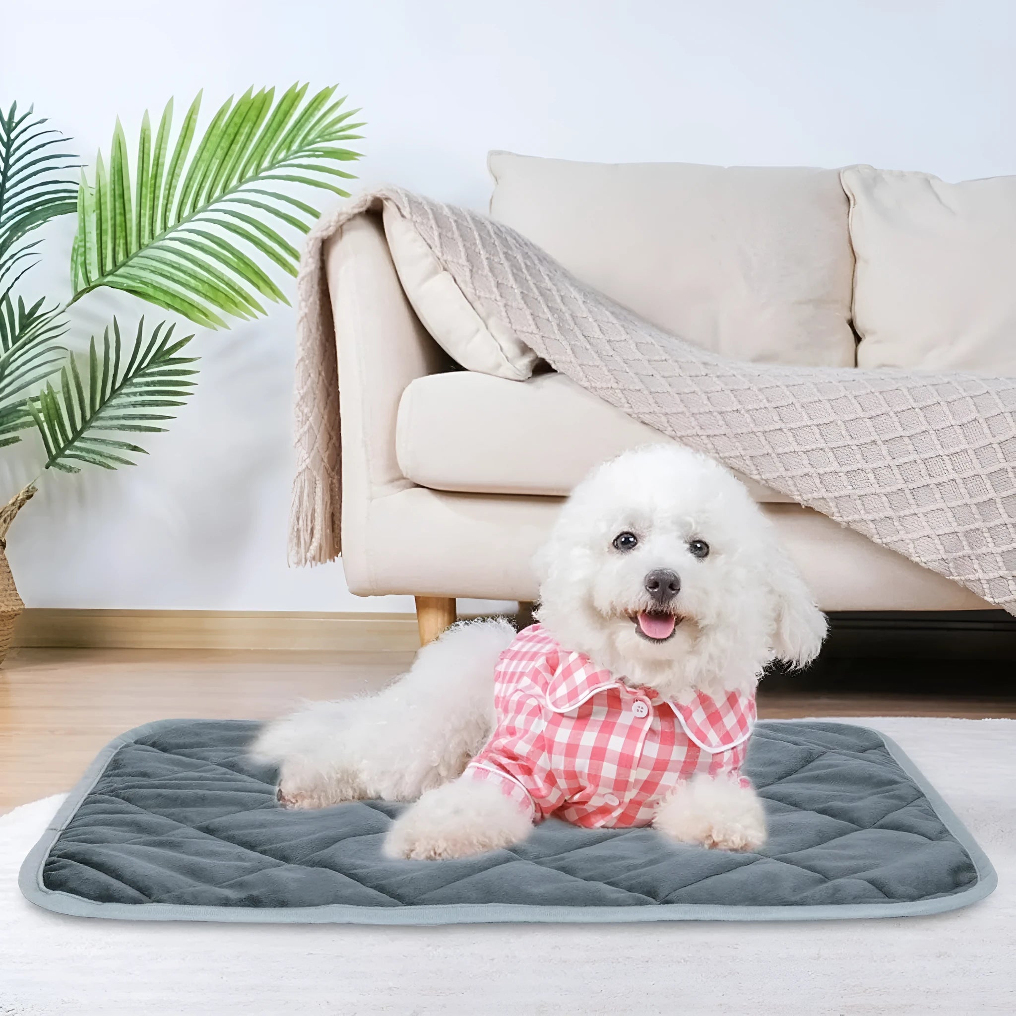 Grey cloth pet cushion in rectangular shape on floor as dog or cat bed