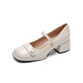 Women's apricot patent leather chunky heel pumps with a square toe and silver buckle fastening.