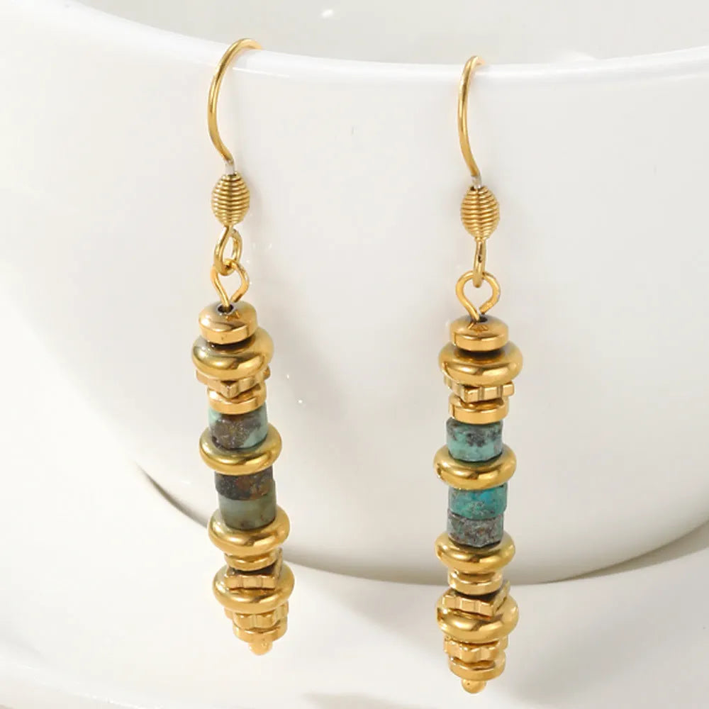Gold geometric titanium steel dangle earrings with a retro design for women.