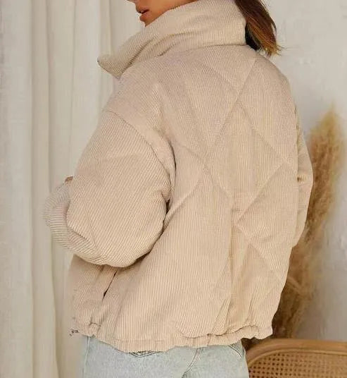 Women's Apricot corduroy zip-front jacket with a stand collar and wadded construction.
