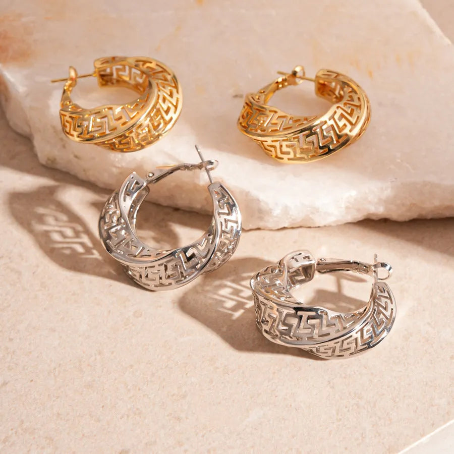 Women's geometric stud earrings with twisted round design in gold and silver electroplated copper
