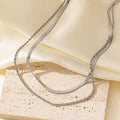 Women's retro solid colour double-layer twist necklace with titanium steel pendant and snake bones chain