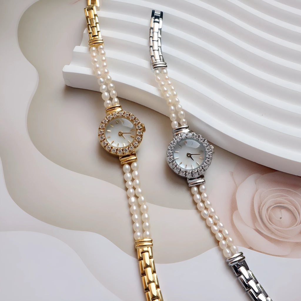 Women's light gold bracelet watch with freshwater pearls and 18mm mineral glass dial