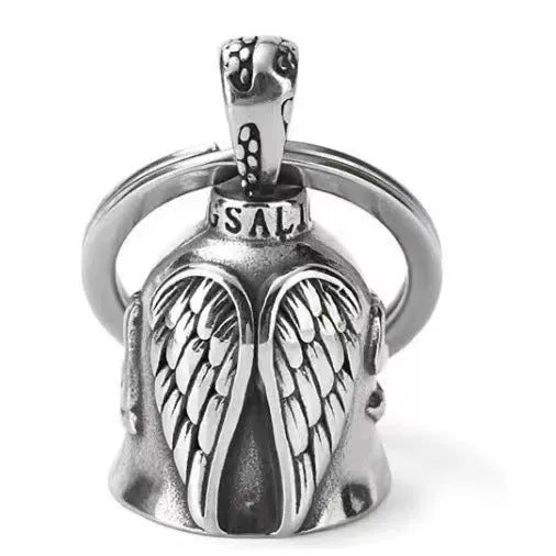 Vintage white angel feather wings alloy keychain and necklace set on a plain background.