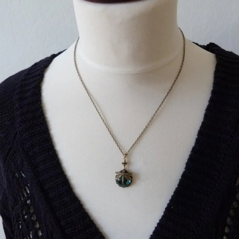 Yellow vintage bronze dragonfly pendant necklace with hand-carved 925 silver detail