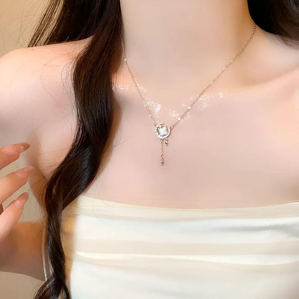 Gold and silver star moon sparkling zirconium necklace on an adjustable copper chain for women.