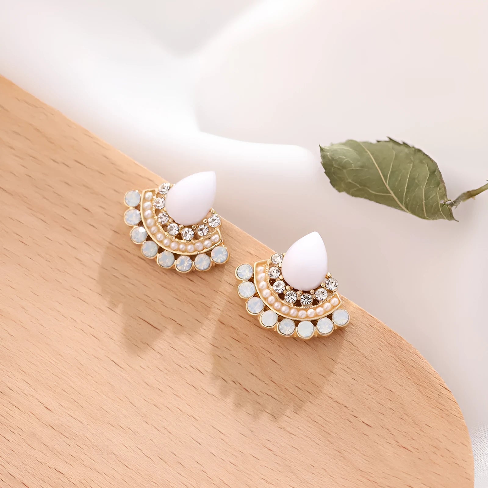 Women's retro fan-shaped rhinestone earrings with electroplated silver finish and geometric design