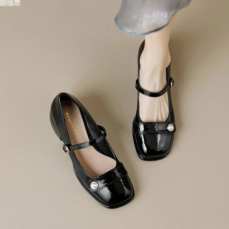 Women's apricot patent leather chunky heel pumps with a square toe and silver buckle fastening.
