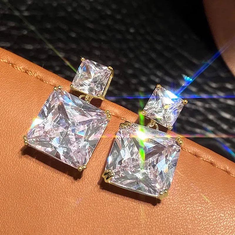 Geometric square design copper earrings with quadrilateral elements in white gold or gold colour
