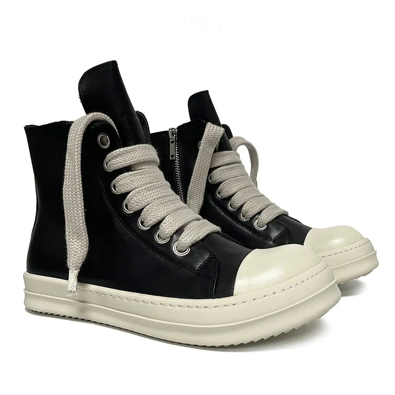 Men's and women's black high-top leather shoes with a side zipper and visible stitching on a round toe