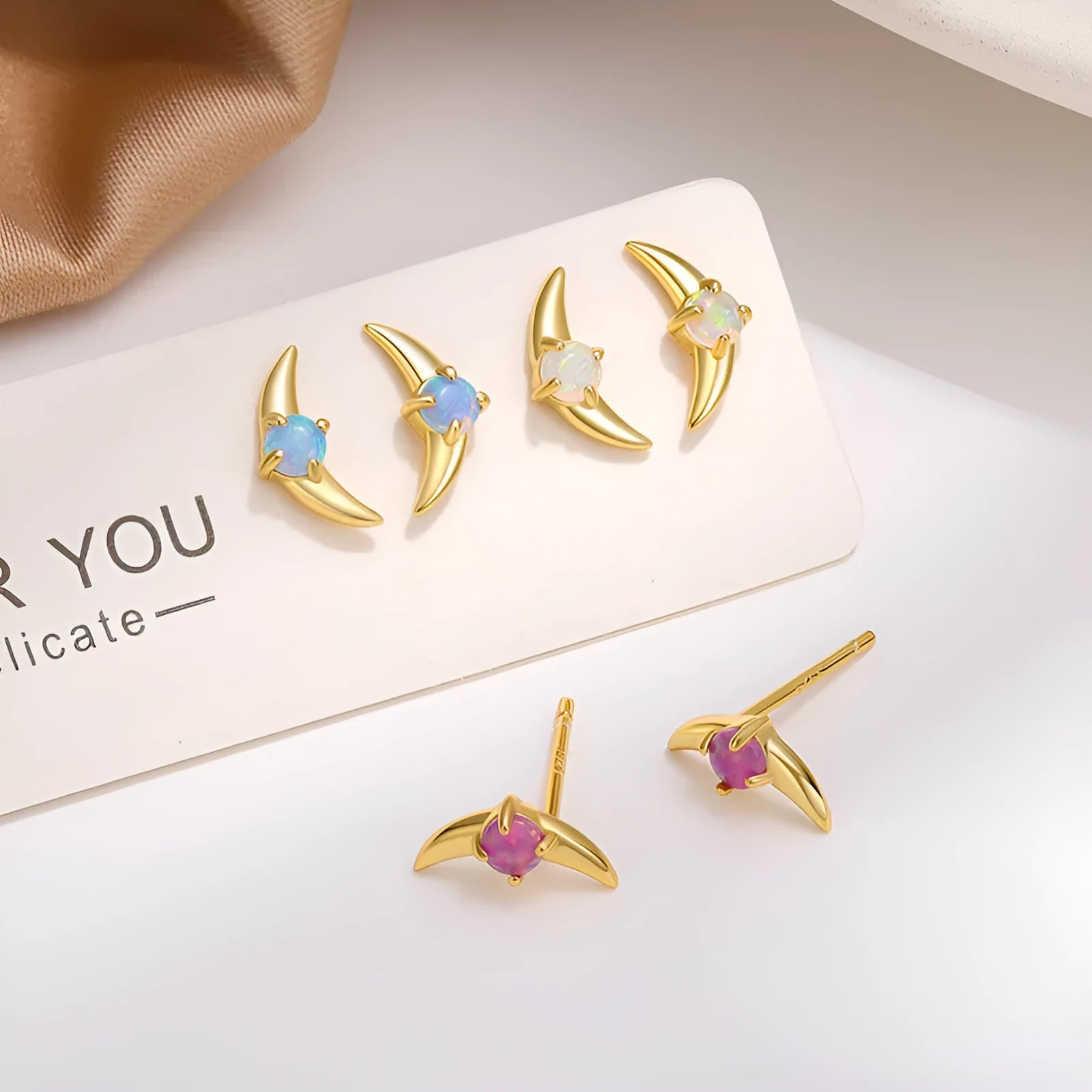 Women's geometric earrings in 925 silver with electroplated finish and stone accents in blue, purple, or white