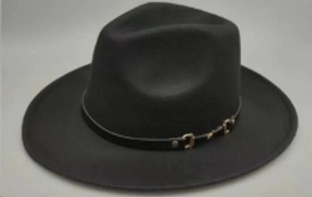 Brown leather velvet cowboy hat with a curved brim and conical crown on a neutral background.