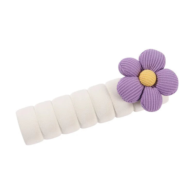Round floral door handle protective casing in soft PEVA material showing anti-collision function