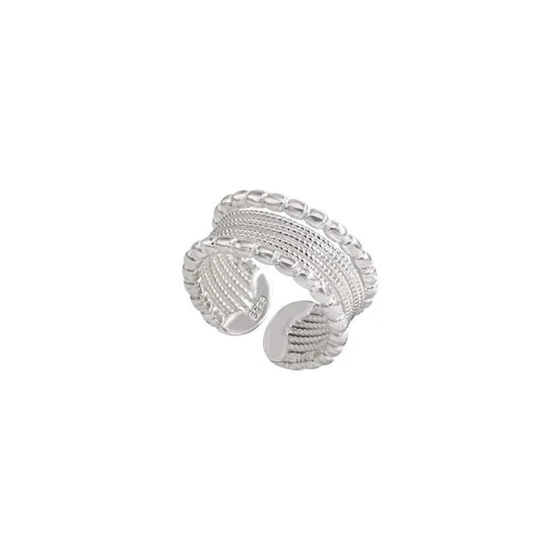 Adjustable opening copper ring with woven twisted multilayer geometric design