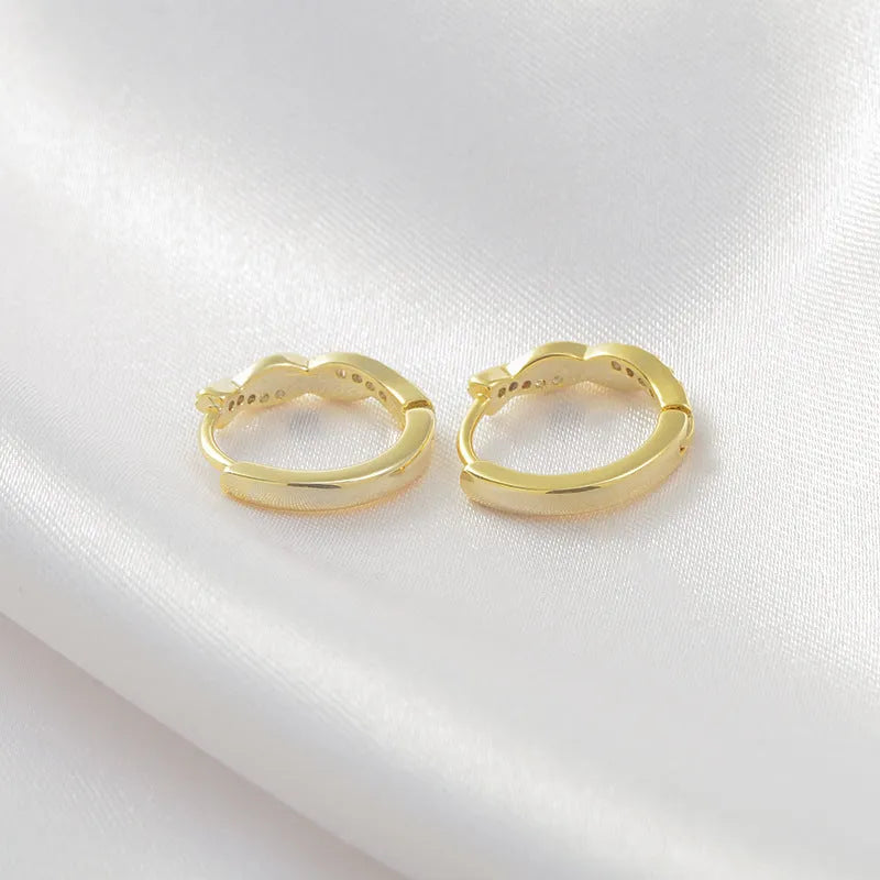 Women's geometric hemp rope earrings in gold and silver colours with diamond-cut copper finish