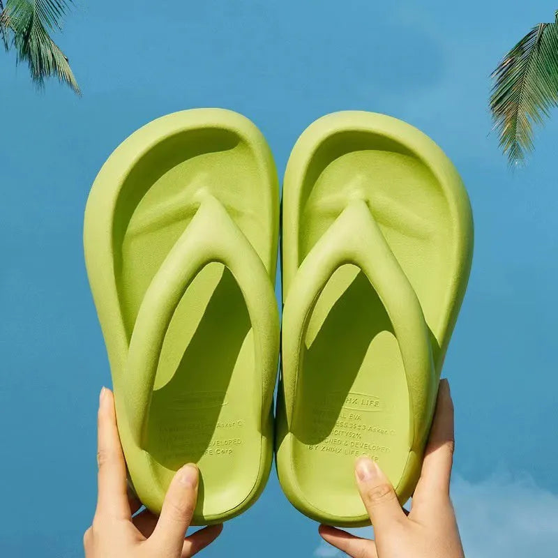 Solid colour EVA flip-flops with thick wedge sole and decorative bow detail
