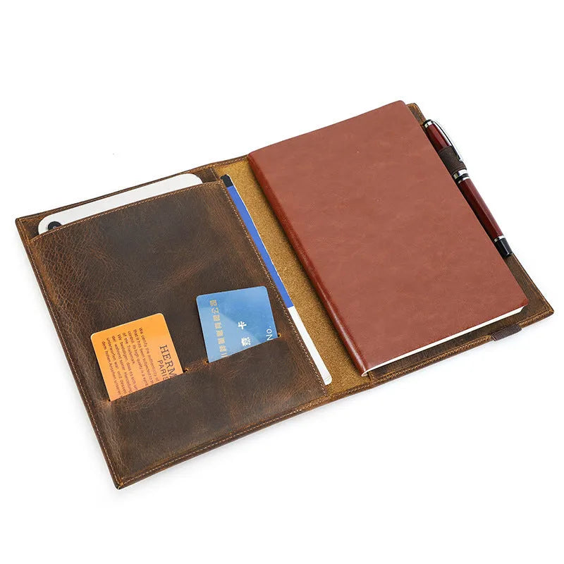 Brown Crazy Horse leather protective sleeve for A5 notebooks with a socket-type closure.