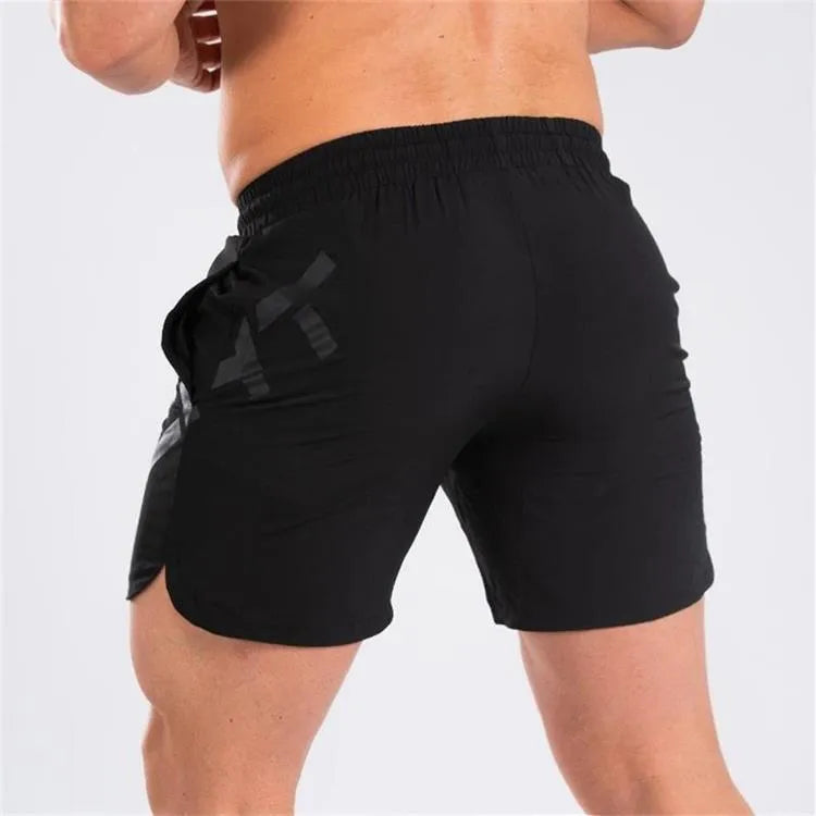 Men's black elastic running shorts with quick-dry fabric and knee-length design for summer training