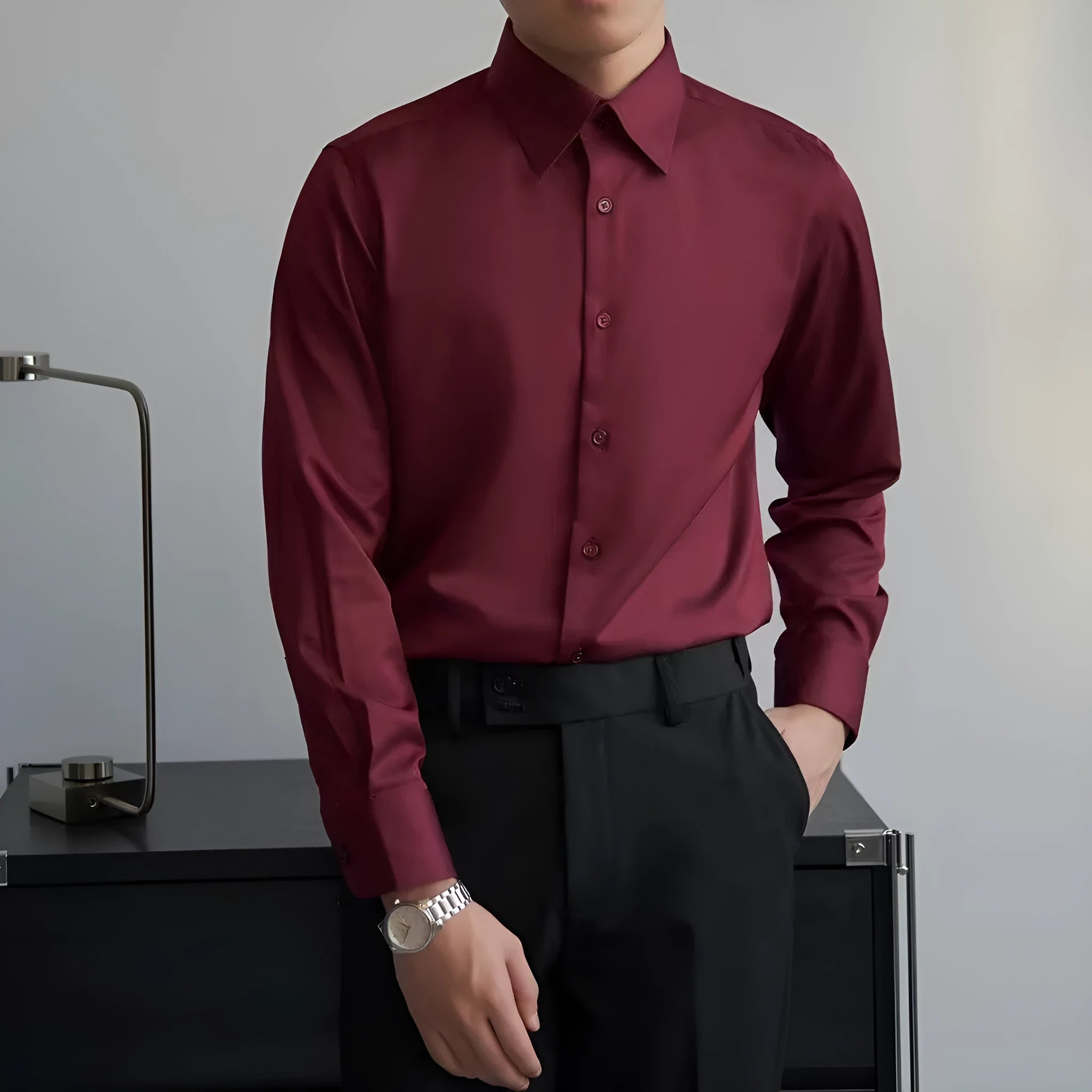 Black men's long sleeve cardigan shirt in slim Korean cut with Japanese retro style details on a model.