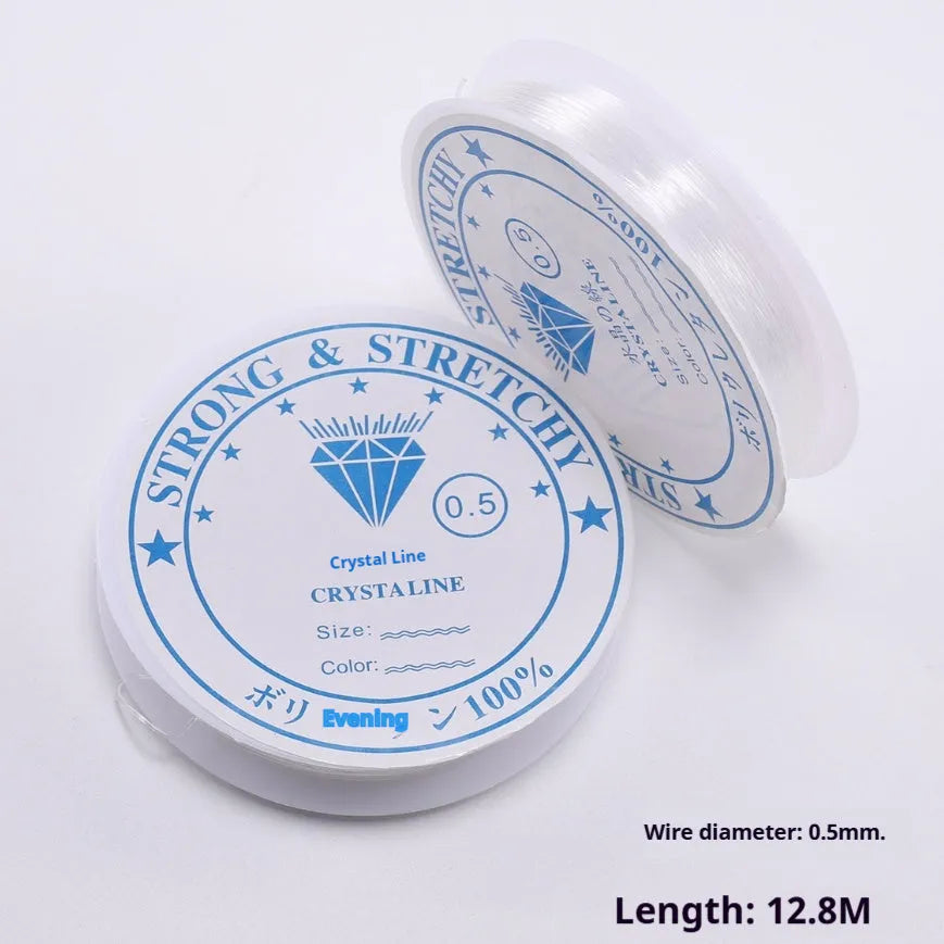 Spool of transparent white elastic cord for jewellery making with diameter options shown.