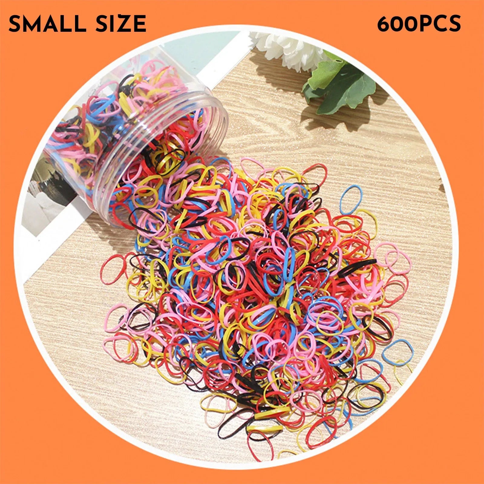 Multi-colour TPU baby hair elastic bands spilling from a reusable container.