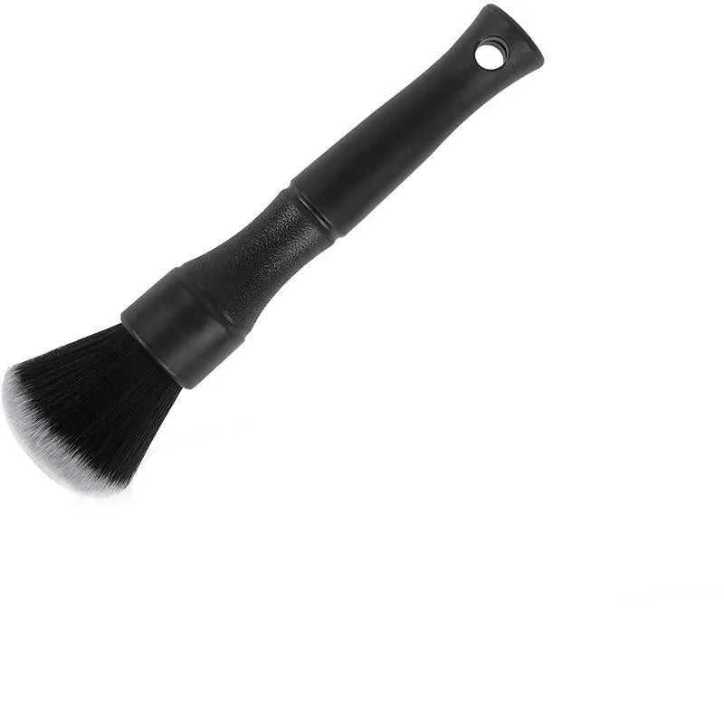 Black car detailing brush with ultra-soft pig hair bristles for gentle interior cleaning