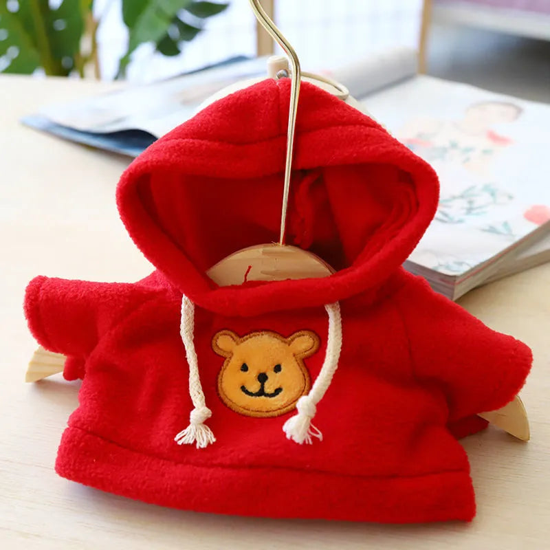 A blue cloth dog hoodie sweater for a small pet, showing the hood and front opening.