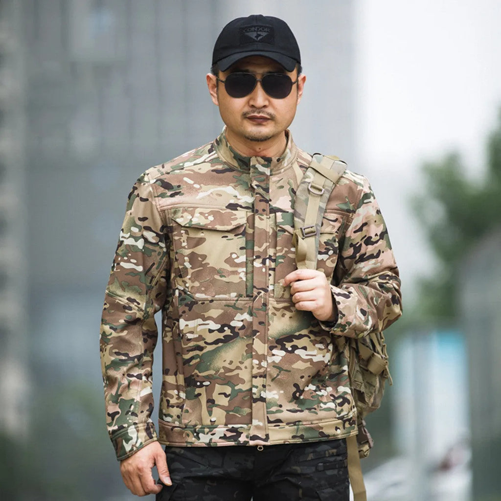 Bone Frog Peak Breaker soft shell jacket in black camouflage for outdoor mountaineering and tactical use.