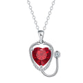 Women's copper necklace with a red diamond electroplated pendant showing stethoscope, wings, and cross design.