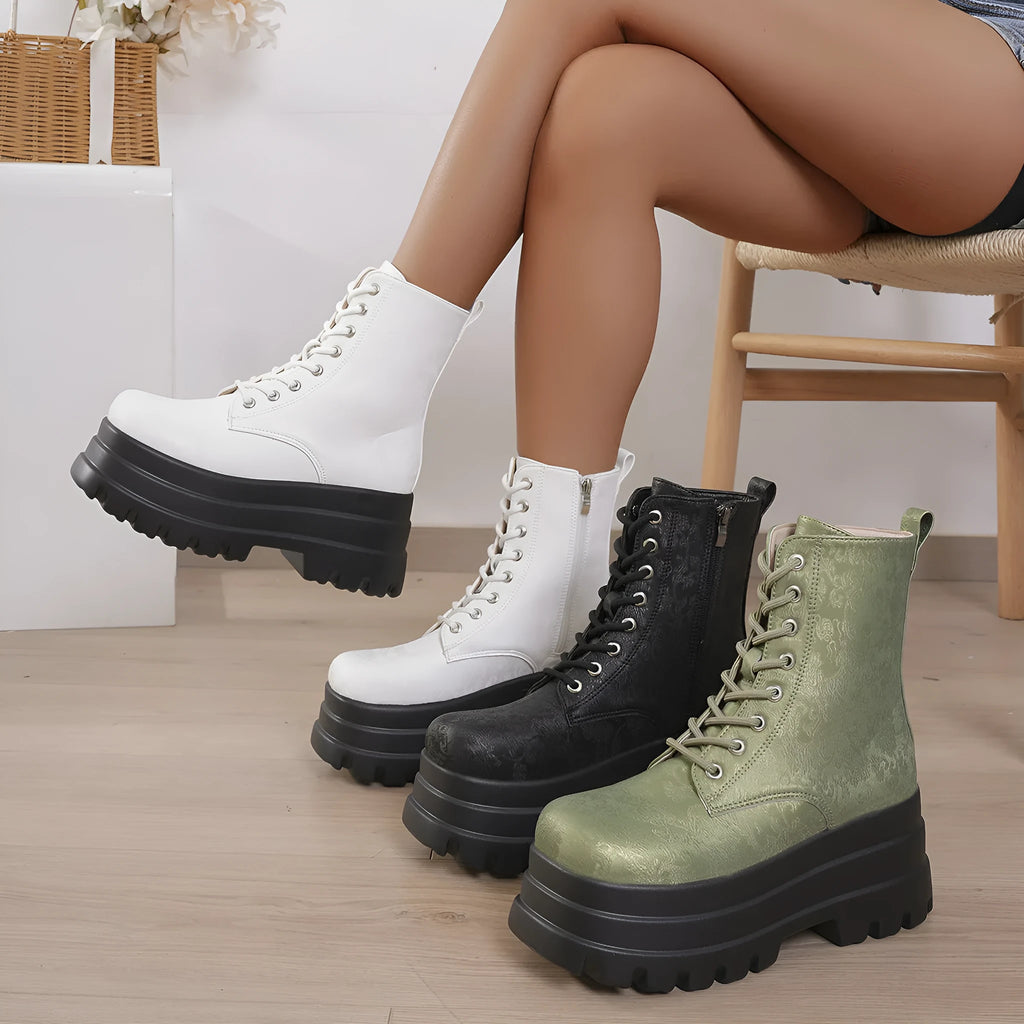 Women's black retro Martin boots with chunky heel, platform sole, and side zip.