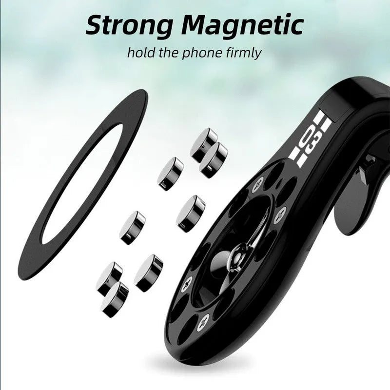 Black magnetic car phone holder attached to vehicle air vent with smartphone mounted