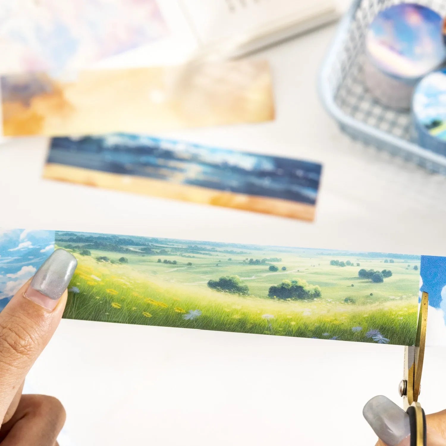 Roll of Japanese paper washi tape with colourful sky cloud patterns, showing 30mm width