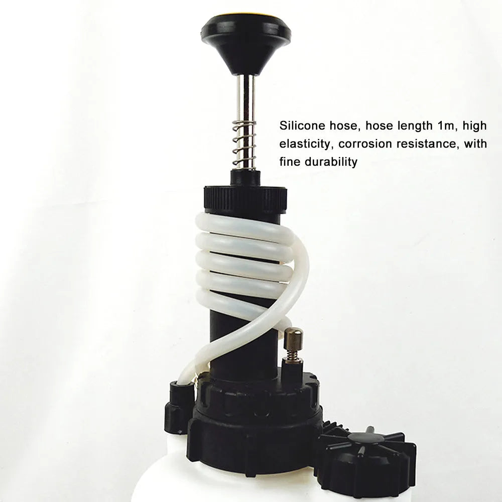 White 3-litre brake oil tank replacement tool with copper, iron and plastic components.