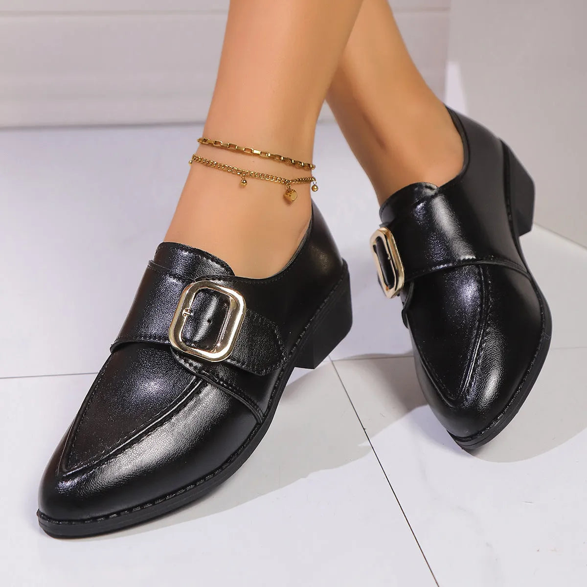 Women's British-style flat shoes with decorative bow, PU upper, and rubber sole in sizes 36-43.